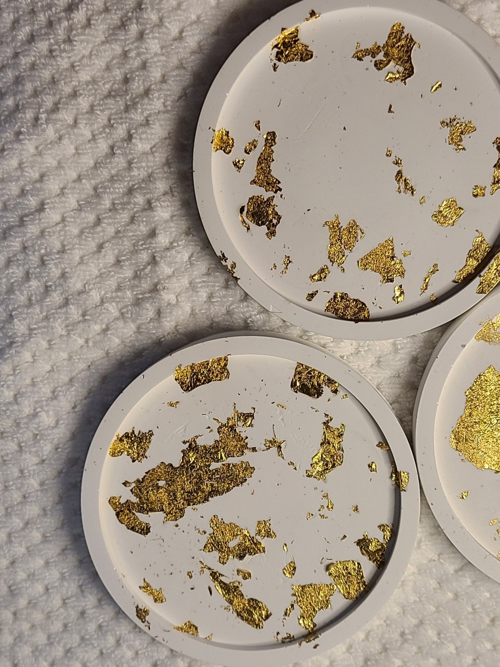 White Round Coasters with Gold Accent